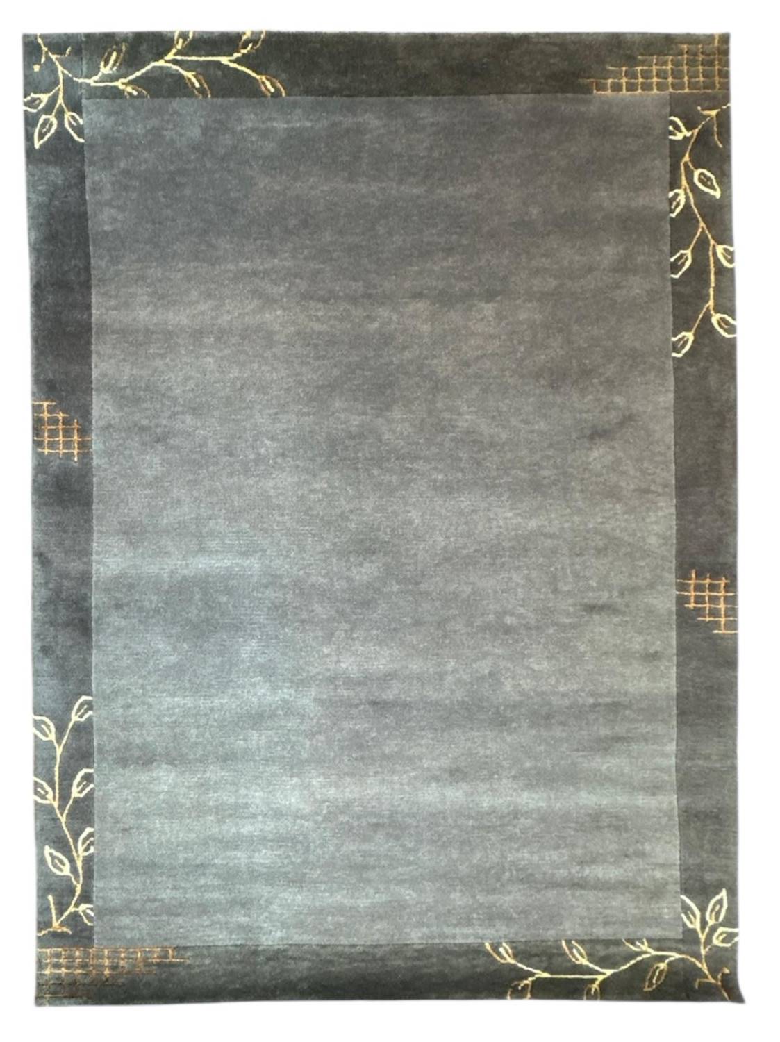 VENUS NEPAL - HANDGEKNÜPFT MODERN als zentrales Design-Element eines Wohnraumes.